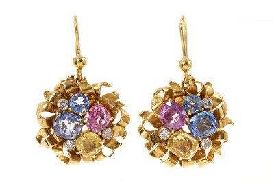 Lot 591 - Pair of 1930s-1950s diamond and multi-coloured sapphire earrings, each with pink, yellow and cornflower blue sapphires