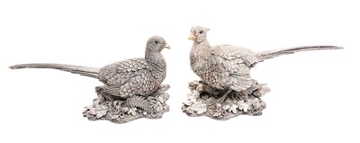 Lot 234 - Pair of contemporary filled silver models of a cock and hen Pheasant by Steve Langford for Country Artists, each realistically modelled and placed in a naturalistic setting, signed by the artist...