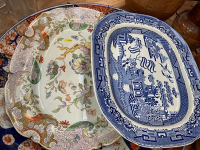 Lot 5016 - Large Imari charger, three Victorian meat plates, and a set of five 19th century graduated salt glazed stoneware jugs