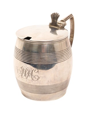 Lot 311 - George III silver mustard pot of barrel form with ribbed bands, blue glass liner, (London 1805), maker Charles Fox, 8.5cm.