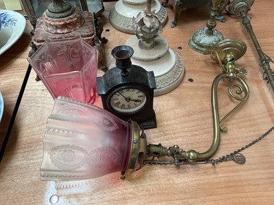 Lot 5020 - Group of antique and later lighting, including candelabra, brass wall mounted light with cranberry shade, etc