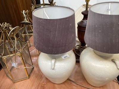 Lot 5023 - Three brass and glass ceiling lights, a par of wooden urn shaped lamps, a pottery lamp, and three shades