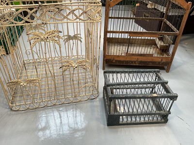 Lot 5042 - Three wire bird cages, including two with wooden frames (3)