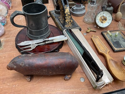 Lot 5047 - Objets vertu and sundries, including a pair of Art Deco spelter lion bookends (a/f), Inuit sculpture, Welsh love spoon, leather and lead pig door stop, etc