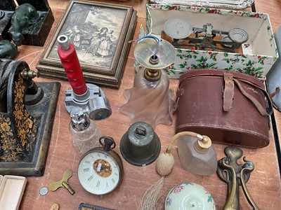 Lot 5047 - Objets vertu and sundries, including a pair of Art Deco spelter lion bookends (a/f), Inuit sculpture, Welsh love spoon, leather and lead pig door stop, etc