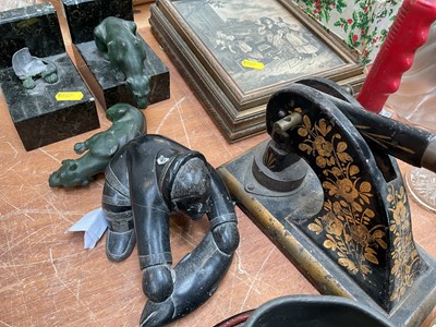 Lot 5047 - Objets vertu and sundries, including a pair of Art Deco spelter lion bookends (a/f), Inuit sculpture, Welsh love spoon, leather and lead pig door stop, etc