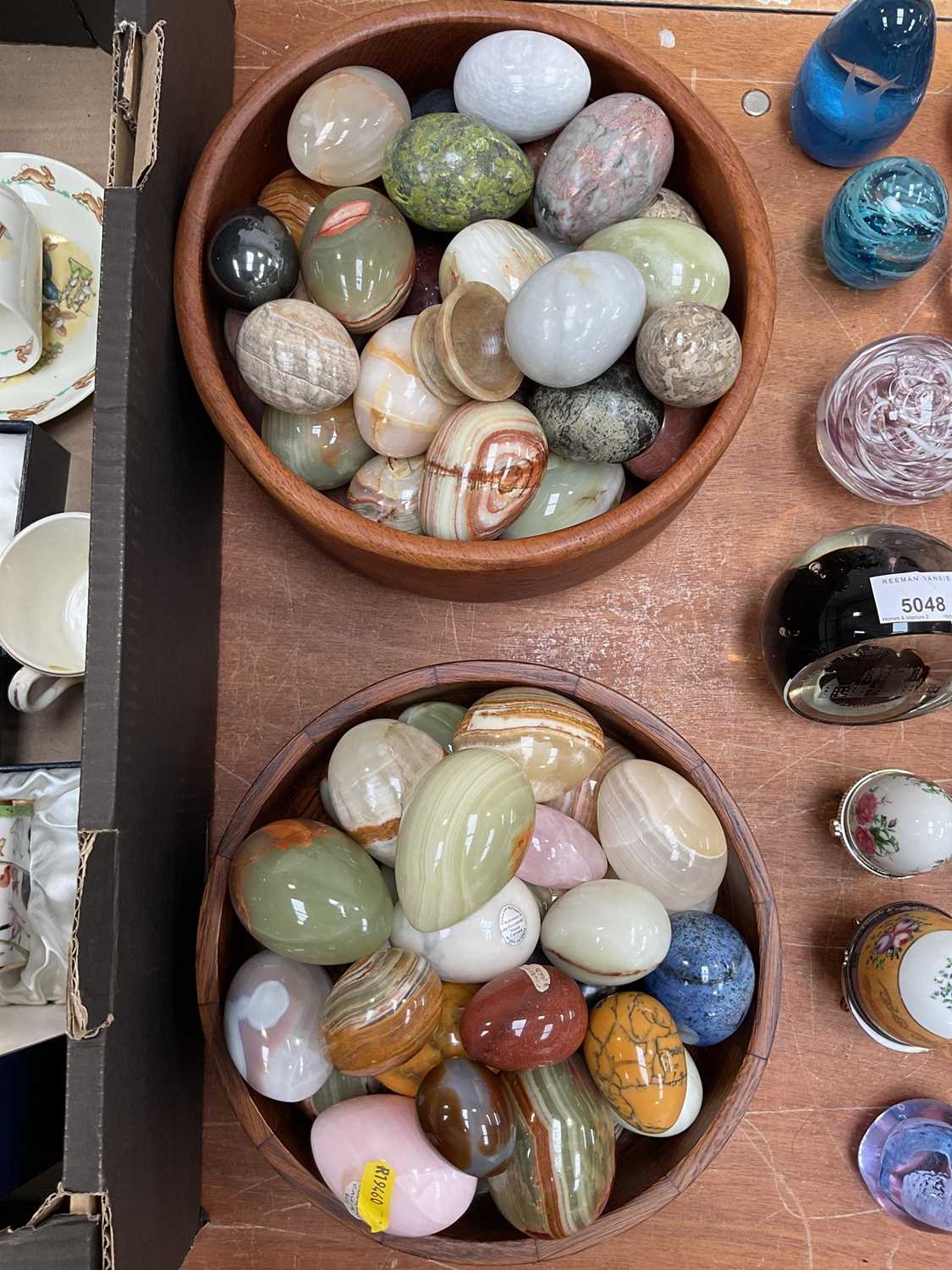 Lot 5049 - Collection of specimen mineral eggs in two wooden bowls