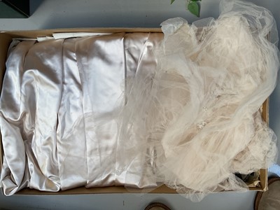 Lot 5066 - Dickins & Jones wedding dress in original box, a mahogany canteen with some silver plated cutlery, and an artificial flower display