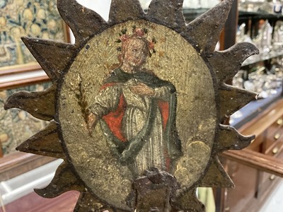 Lot 1513 - 19th century, or earlier, painted metal double-sided table screen depicting figures within a sunburst, on circular base