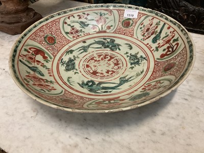Lot 1519 - Late 16th / early 17th century Southern Chinese Swatow charger decorated with bird and floral panels