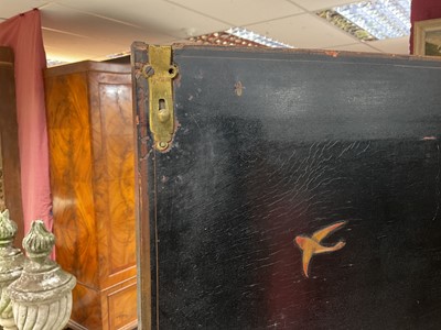 Lot 1522 - Late 17th / early 18th century Chinese lacquer cabinet on stand, the twin hinged doors decorated with landscapes, brass strap hinges, enclosing an arrangment of drawers, on square legs