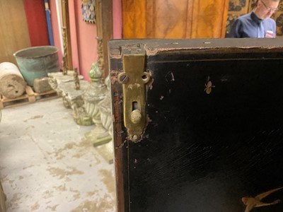 Lot 1522 - Late 17th / early 18th century Chinese lacquer cabinet on stand, the twin hinged doors decorated with landscapes, brass strap hinges, enclosing an arrangment of drawers, on square legs
