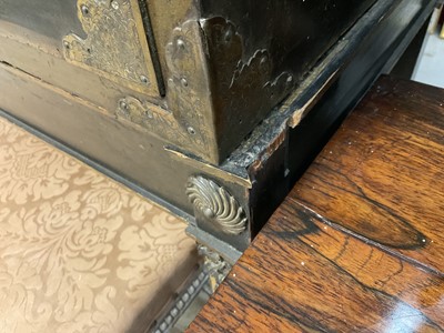 Lot 1522 - Late 17th / early 18th century Chinese lacquer cabinet on stand, the twin hinged doors decorated with landscapes, brass strap hinges, enclosing an arrangment of drawers, on square legs