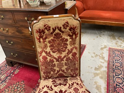 Lot 1524 - Queen Anne walnut high back side chair with show-wood frame, carved cabriole legs and pad feet, upholstered partially in cut velvet damask