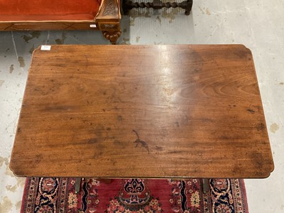 Lot 1526 - George IV mahogany table with shaped rectangular top above straight supports on splayed legs and brass capped castors, 91cm wide