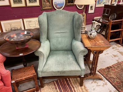 Lot 1532 - Georgian-style wing armchair upholstered in green fabric, on square legs