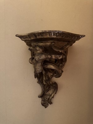 Lot 1567 - 18th century gilt bracket, the bowed platform above foliate scroll supports Provenance: Edward Hurst Antiques, Salisbury, 22nd June 1995