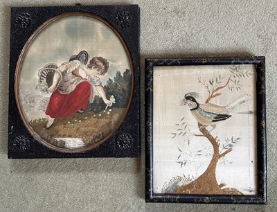 Lot 1690 - Georgian silk and woolwork panel depicting a girl picking flowers, in original ebonised frame, 34cm x 29cm overall, together with another antique silk work panel, in chinoiserie frame (2)