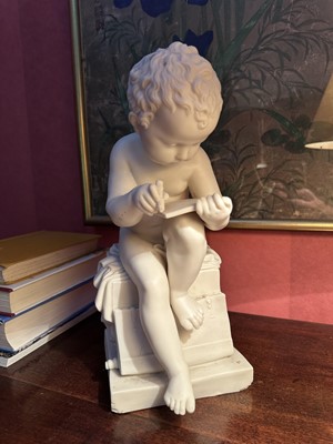 Lot 1768 - Victorian Parian ware figure of a boy writing