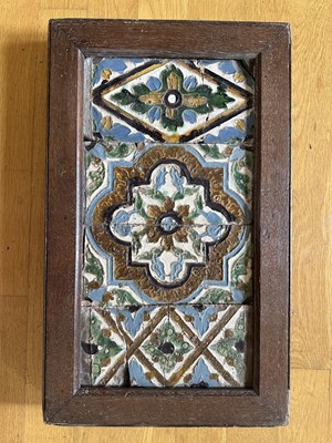 Lot 1837 - Early 16th century Spanish tiles presented in an oak frame, 37cm x 60cm overall