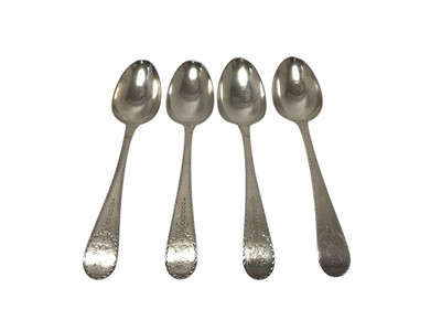 Lot 377 - Matched set of four bright cut engraved silver tablespoons