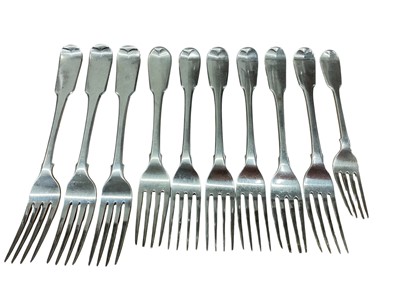 Lot 381 - Matched set of nine fiddle pattern silver table forks