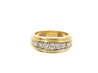 Lot 610 - Diamond ring with seven brilliant cut diamonds in 18ct yellow gold setting