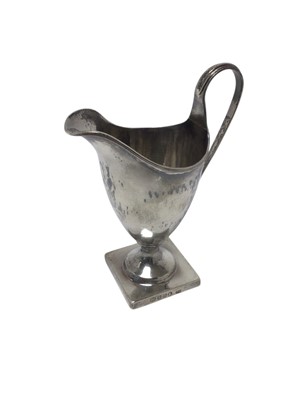 Lot 351 - Georgian silver helmet shaped cream jug