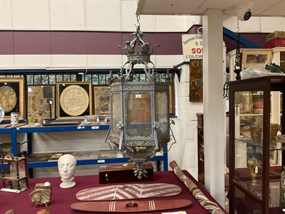 Lot 1925 - Antique wrought iron and painted garden lantern of hexagonal form with elaborate acanthus leaf ornament and glazed sides, 120cm high. Provenance: believed to have been removed from a Roth...