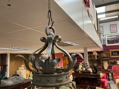 Lot 1925 - Antique wrought iron and painted garden lantern of hexagonal form with elaborate acanthus leaf ornament and glazed sides, 120cm high. Provenance: believed to have been removed from a Roth...