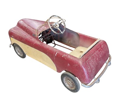 Lot 85 - Vintage Tri-ang Ford pedal car in original condition, 105cm in overall length.