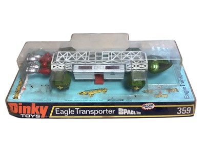 Lot 1775 - Dinky Toys (c1975) Space 1999 Eagle Transporter with green & white body and red & silver thrusters, on light blue plinth and bubble pack, No.359 (1)