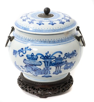Lot 200 - Chinese Kangxi blue and white vessel and cover, twin handled, on associated carved hardwood base
