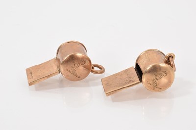 Lot 621 - Two early 20th century 9ct gold whistle pendants