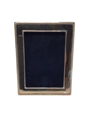 Lot 368 - Contemporary silver photograph frame of rectangular form with gadrooned border, (Sheffield 1998)