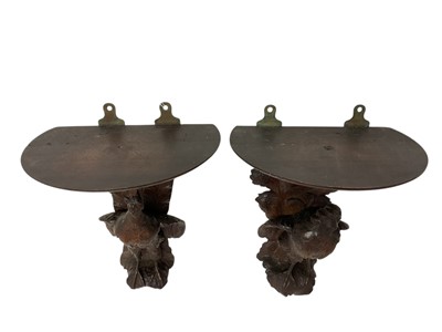 Lot 1207 - Pair of 19th century Black Forest carved wall brackets