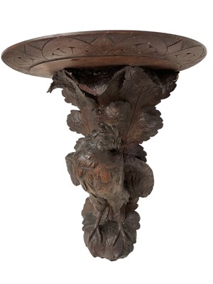 Lot 1207 - Pair of 19th century Black Forest carved wall brackets