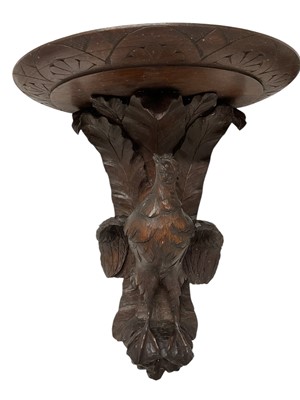 Lot 1207 - Pair of 19th century Black Forest carved wall brackets