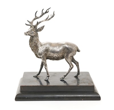 Lot 356 - Mid-Victorian silver model of a stag, mounted on an ebonised wood base.