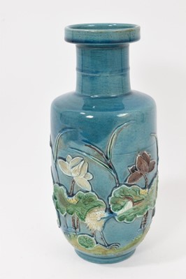 Lot 247 - Chinese porcelain vase, the turquoise glazed ground decorated in high relief with Heron, water lilies and rushes. Seal mark to base. 22cm high