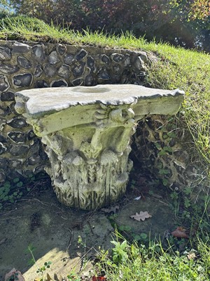 Lot 1930 - Pair of 18th century English carved stone classical capitals with scrolling mounts, later applied lead tops, 52cm high overall