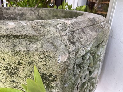 Lot 1940 - Good antique carved stone font of octagonal form with four leaf carved panels, on octagonal columns and stepped base, 67cm wide x 100cm high