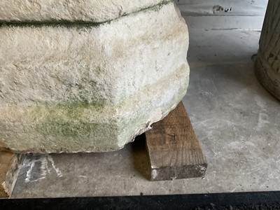 Lot 1940 - Good antique carved stone font of octagonal form with four leaf carved panels, on octagonal columns and stepped base, 67cm wide x 100cm high