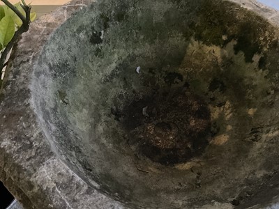 Lot 1940 - Good antique carved stone font of octagonal form with four leaf carved panels, on octagonal columns and stepped base, 67cm wide x 100cm high