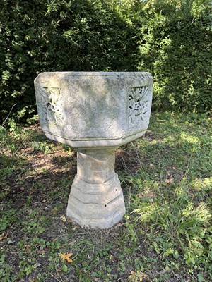 Lot 1940 - Good antique carved stone font of octagonal form with four leaf carved panels, on octagonal columns and stepped base, 67cm wide x 100cm high
