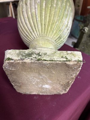 Lot 1941 - Antique Coade stone urn, the foliate knop above a domed cover and fluted body, circular socle and square base, approximately 60cm high