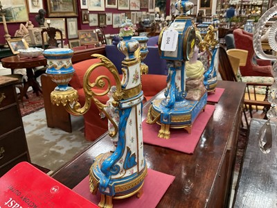 Lot 804 - 19th century French porcelain clock and garniture in the style of Sèvres.