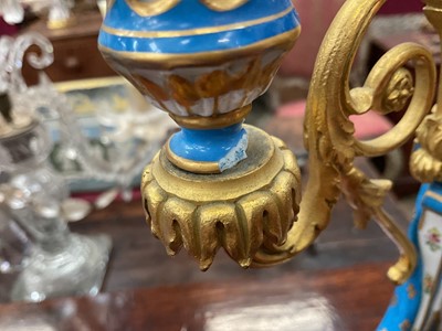 Lot 804 - 19th century French porcelain clock and garniture in the style of Sèvres.