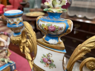 Lot 804 - 19th century French porcelain clock and garniture in the style of Sèvres.