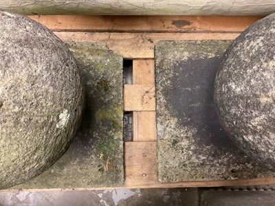 Lot 1948 - Pair of reconstituted garden balls on flared square bases, 35.5cm square x 38cm high